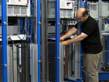 Technician Repairing a Server